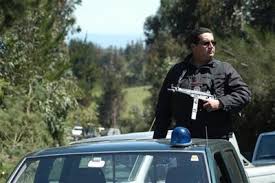 Prosecutor Elgueta entering into an autonomous Mapuche community fully armed the day of the alleged ambush by Mapuche Warriors